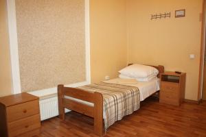 Postel nebo postele na pokoji v ubytování Inn Khlibodarskiy