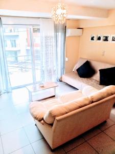 Postel nebo postele na pokoji v ubytování Demy's apartment