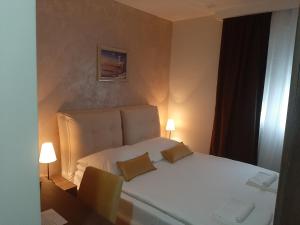 Postel nebo postele na pokoji v ubytování Hotel Usce