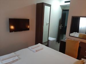 Postel nebo postele na pokoji v ubytování Hotel Usce