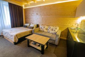 Postel nebo postele na pokoji v ubytování Room225 - New Gudauri Suites