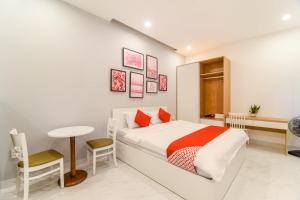 Giường trong phòng chung tại Gia Han Apartment Da Nang