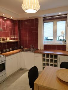 Kuchyňa alebo kuchynka v ubytovaní Apartament pod Jaworzyną