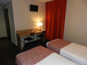 Letto o letti in una camera di Hôtel Gloria & Avenue