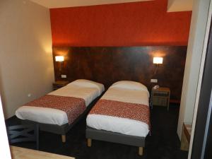 Letto o letti in una camera di Hôtel Gloria & Avenue