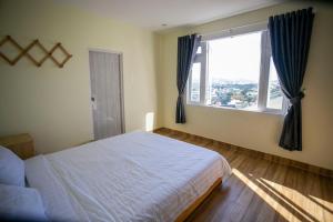 Postel nebo postele na pokoji v ubytování Giao Giao House Homestay