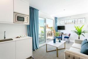 TV a/nebo společenská místnost v ubytování Genteel Home Mateos Gago