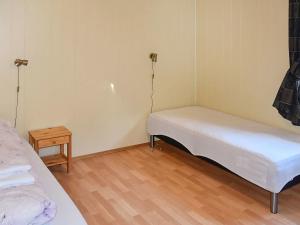 Кровать или кровати в номере Holiday home Aukra