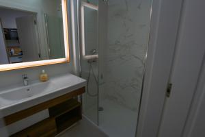 Kúpeľňa v ubytovaní Apartament z HUŚTAWKĄ Bel Mare
