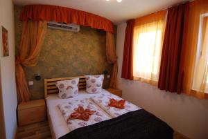 Кровать или кровати в номере Soline Bay Seashore Residence