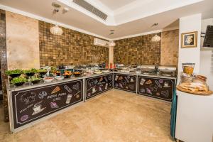 Kuchyň nebo kuchyňský kout v ubytování Mera Park Hotel