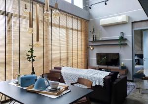 Posezení v ubytování Expressionz Suites By iHost Global