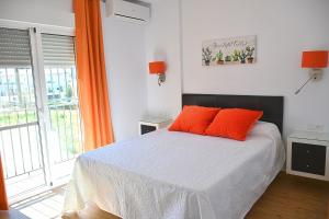 Łóżko lub łóżka w pokoju w obiekcie Luna de Nerja