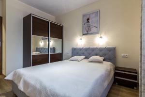Posteľ alebo postele v izbe v ubytovaní Apartamenty Granitica Zakopane