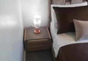
سرير أو أسرّة في غرفة في Appart Hotel Tanger Paname

