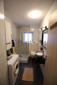 Ένα μπάνιο στο Appartement Turan