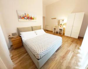 Postel nebo postele na pokoji v ubytování B&B Floridiana