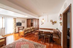 TV a/nebo společenská místnost v ubytování Residence Salvan