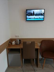 Telewizja i/lub zestaw kina domowego w obiekcie Apartment Waldhaus Opitz