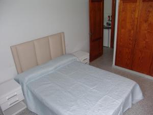 A bed or beds in a room at TABLERO 302, MAGNIFICO Apto 6 pax cerca PLAYA INGLES