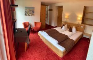 Posteľ alebo postele v izbe v ubytovaní Berghotel-Gasthof Gstrein