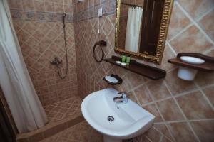 A bathroom at Eudora Full Guest House