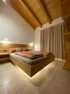 a bedroom with a large bed in a room at Villa 22 in Oetz