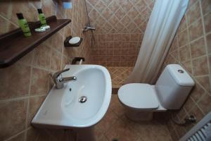 A bathroom at Eudora Full Guest House