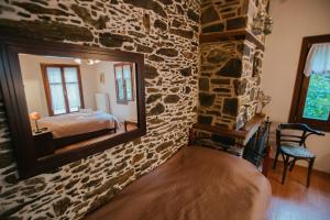 A bed or beds in a room at Eudora Full Guest House