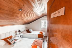 Postel nebo postele na pokoji v ubytování Baleia Atlantic - Piscina