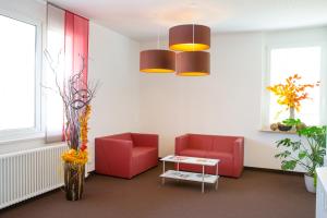 Posezení v ubytování Das Gästehaus Puschendorf