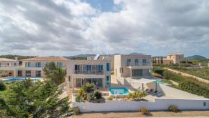 an aerial view of a resort with a swimming pool at Cala Murada - 2778-83 Mallorca in Cala Murada