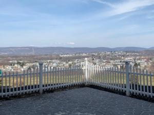 
a view from a balcony of a city at Host Inn an All Suites Hotel in Wilkes-Barre
