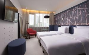 Voodi või voodid majutusasutuse Radisson Blu Hotel Lietuva toas