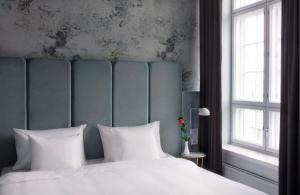 Ένα ή περισσότερα κρεβάτια σε δωμάτιο στο Radisson Blu Seaside Hotel, Helsinki