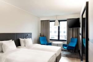Letto o letti in una camera di Radisson Blu Hotel Espoo