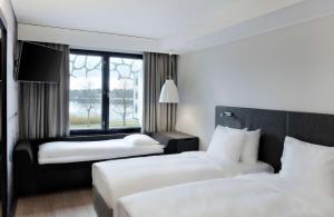Letto o letti in una camera di Radisson Blu Hotel Espoo