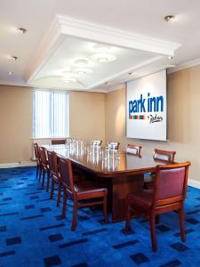 a conference room with a large table and chairs at Park Inn by Radisson Shannon Airport in Shannon