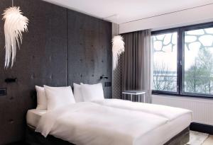 Krevet ili kreveti u jedinici u okviru objekta Radisson Blu Hotel Espoo