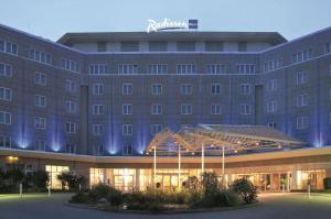 a rendering of the radisson hotel at night at Radisson Blu Hotel Dortmund in Dortmund