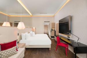 Televiisor ja/või meelelahutuskeskus majutusasutuses Radisson Blu Béke Hotel, Budapest
