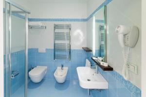 Koupelna v ubytování Hotel Lido