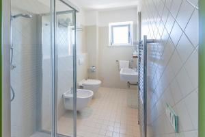 Koupelna v ubytování Hotel Lido