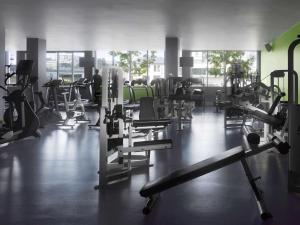 a gym with lots of treadmills and machines at Radisson Blu Hotel, Athlone in Athlone