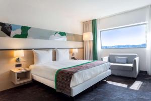 Postel nebo postele na pokoji v ubytování Park Inn by Radisson Leuven + 34 fotografií