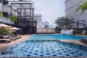 Bazén v ubytování AIHO Hotel Medan nebo v jeho okolí