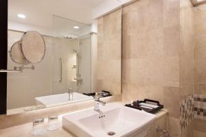 Koupelna v ubytování AIHO Hotel Medan