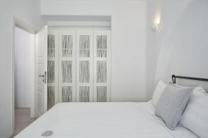 Postel nebo postele na pokoji v ubytování DUNES - Semi Based Apartment with Indoor Garden - Part Of White Dunes Luxury Boutique Hotel + 37 fotografií