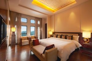 Cama ou camas em um quarto em Radisson Blu Hotel Liuzhou