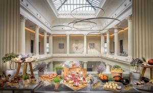 a large room with fruits and vegetables on display at Radisson BLU Hotel Nantes in Nantes